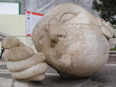 statue of head outside st. eustache, paris